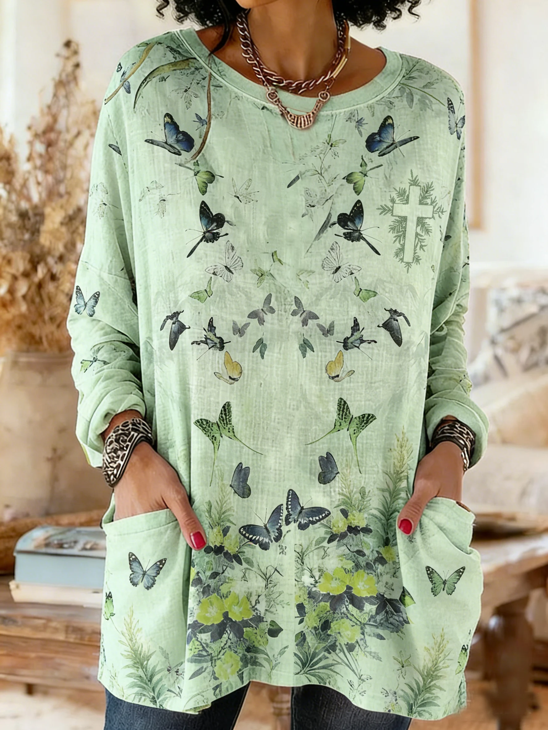 Women's elegant floral round-neck cotton and linen top for winter.