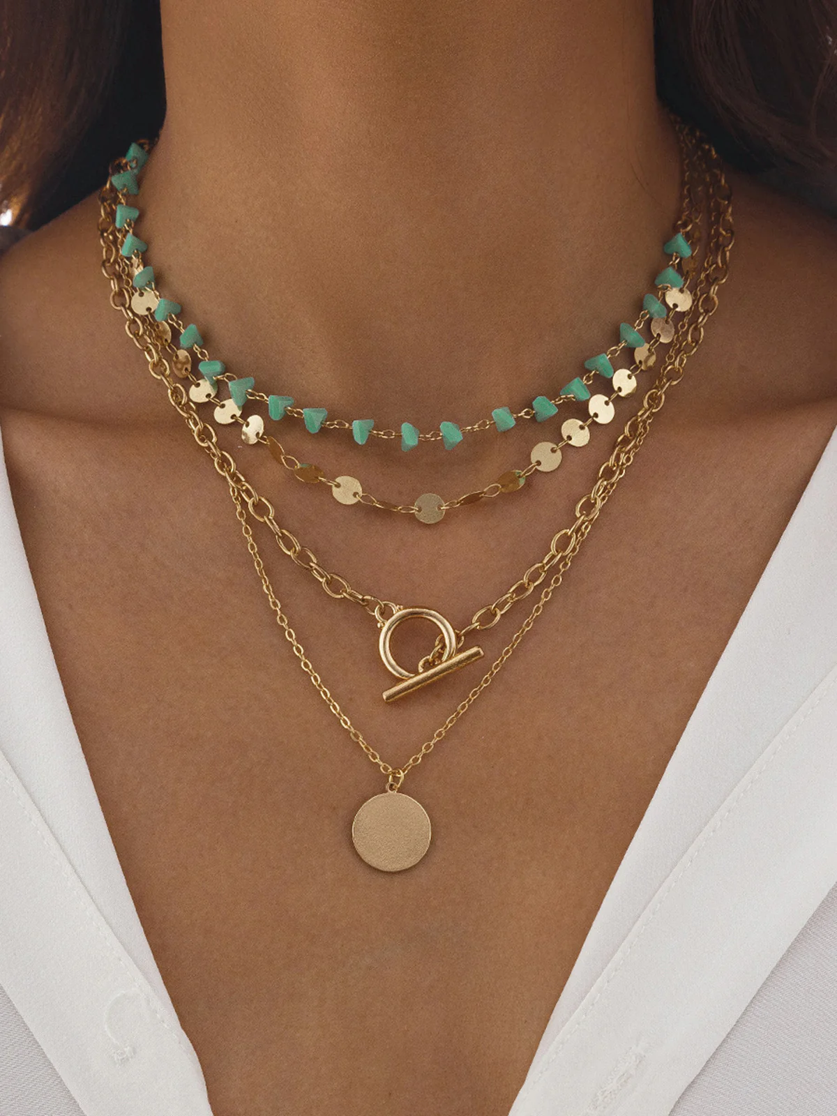 Layered Gold-Chain Necklace With Turquoise Beads And Circular Pendant