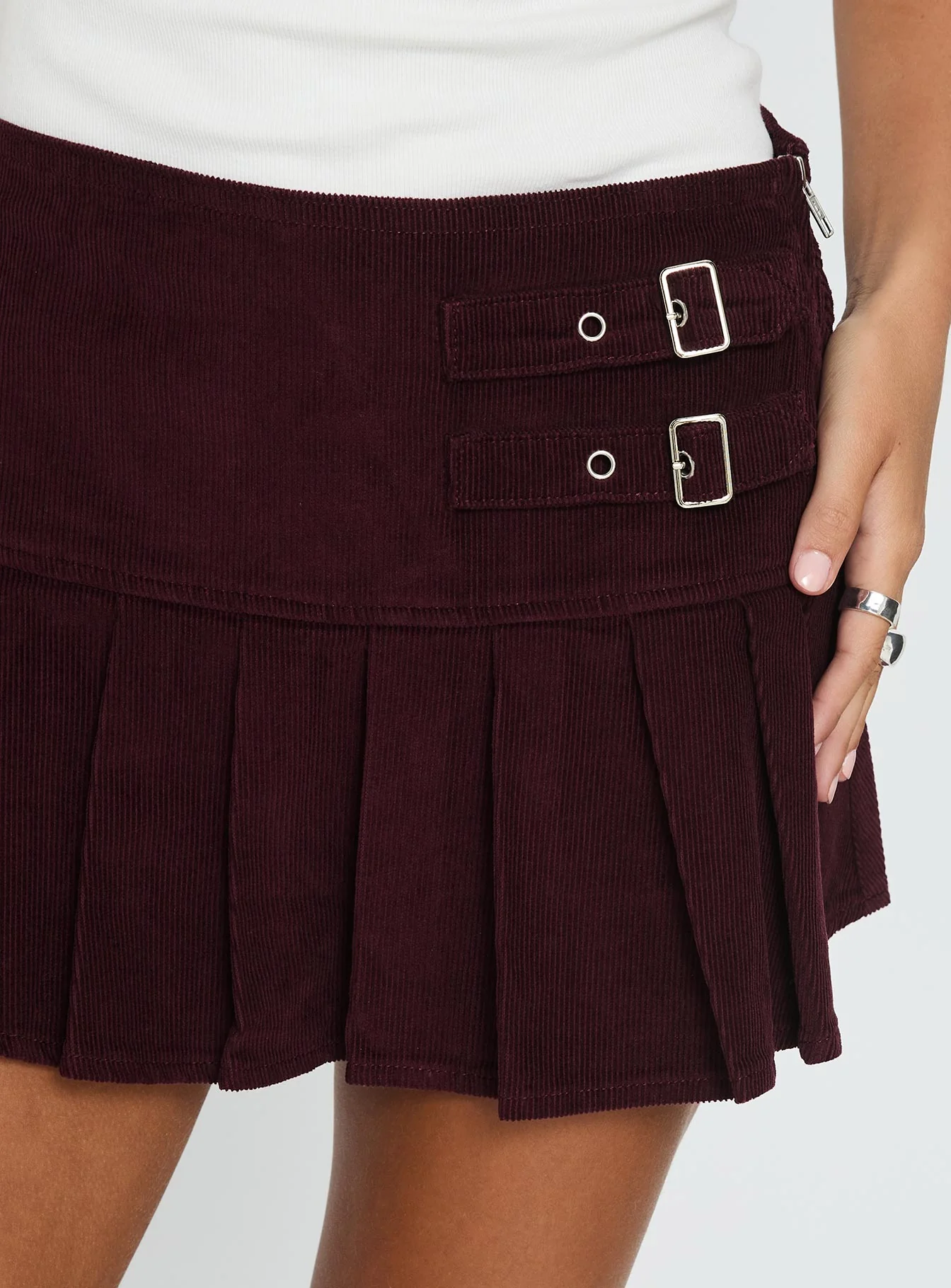 Academe Buckle Pleat Mini Skirt Currant