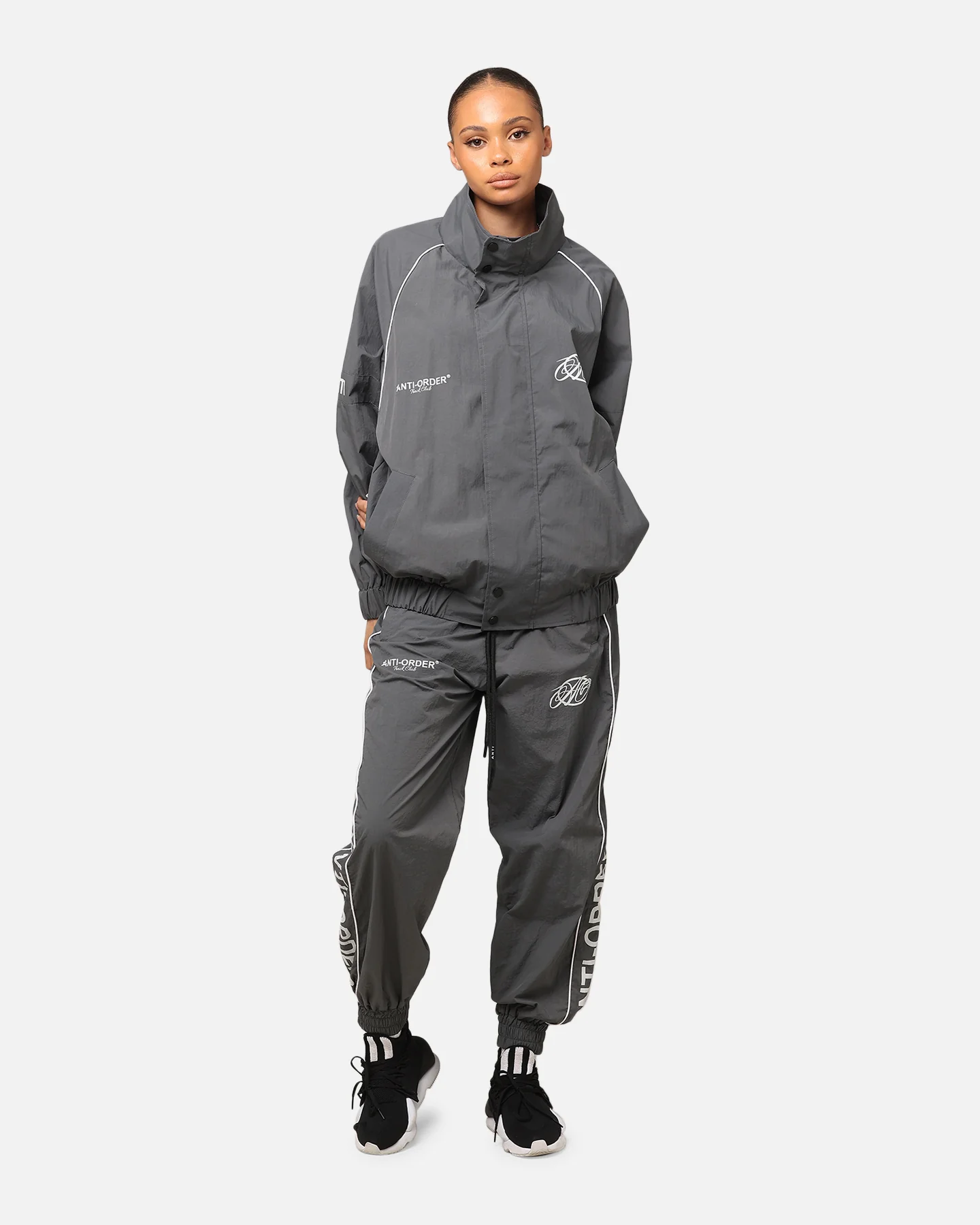 The Anti Order Track Club Windbreaker Jacket Dark Grey/Grey