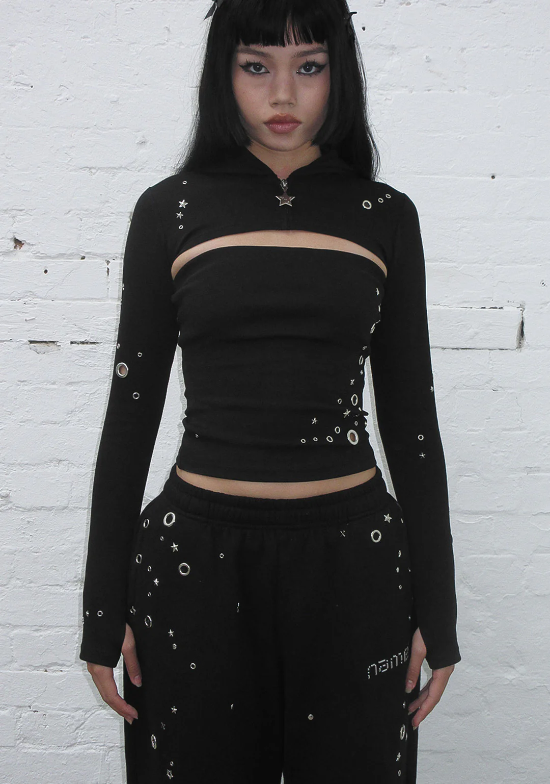 GLITCH EYELET ZIP HOODED SHRUG