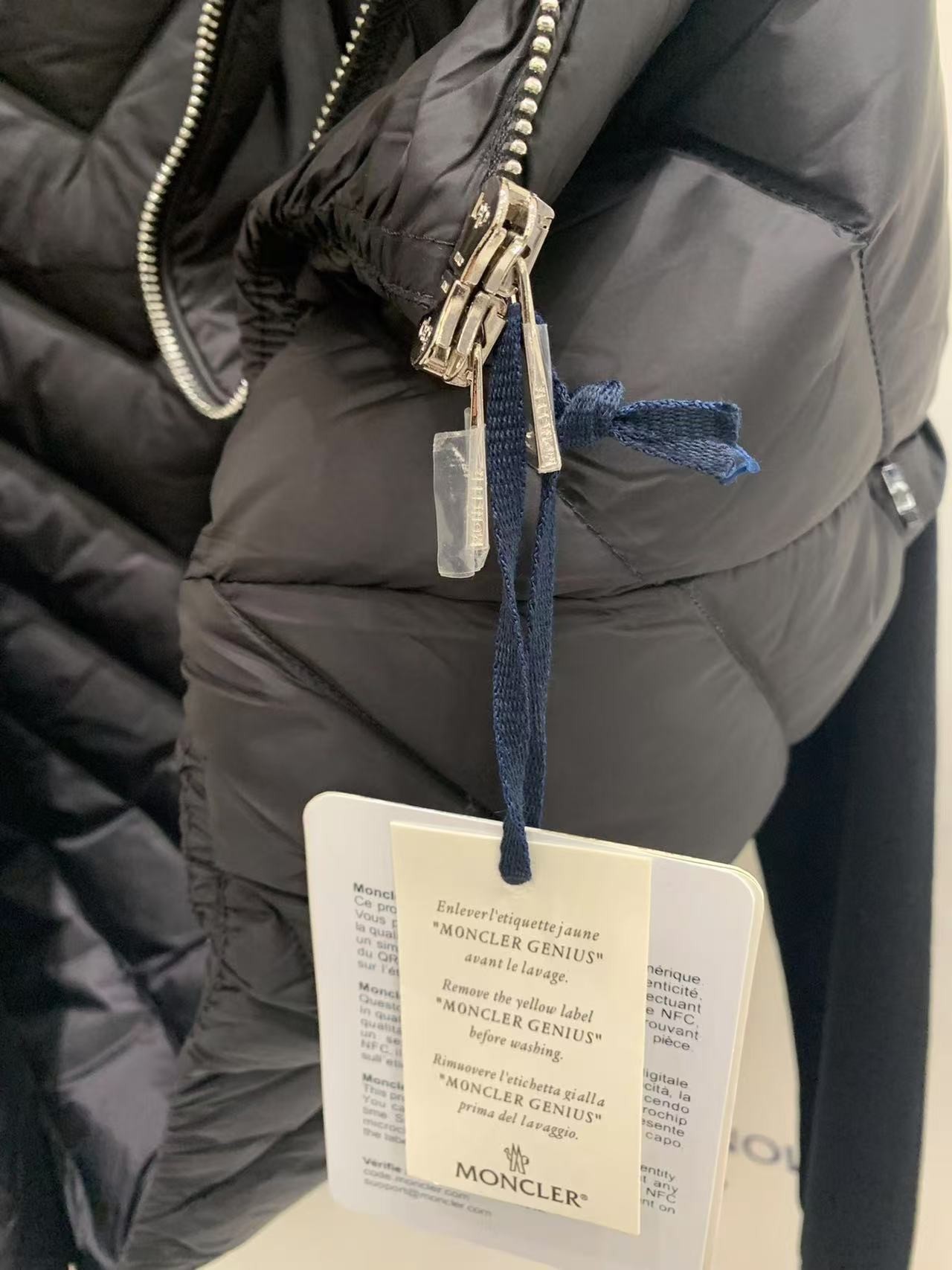 MONC new women's V-pattern stitching knitted sleeves stand collar down jacket