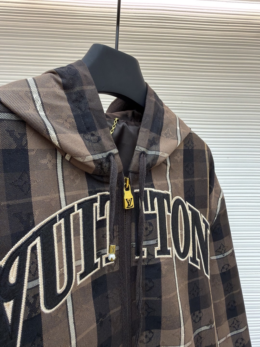 L X V Checkered hooded college-style jacket 2025