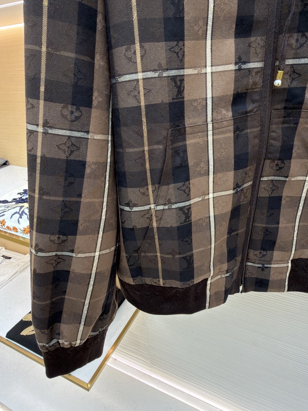 L X V Checkered hooded college-style jacket 2025