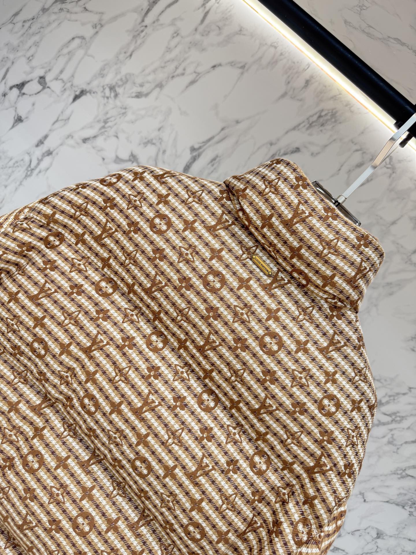 L X V Down Jacket 2025