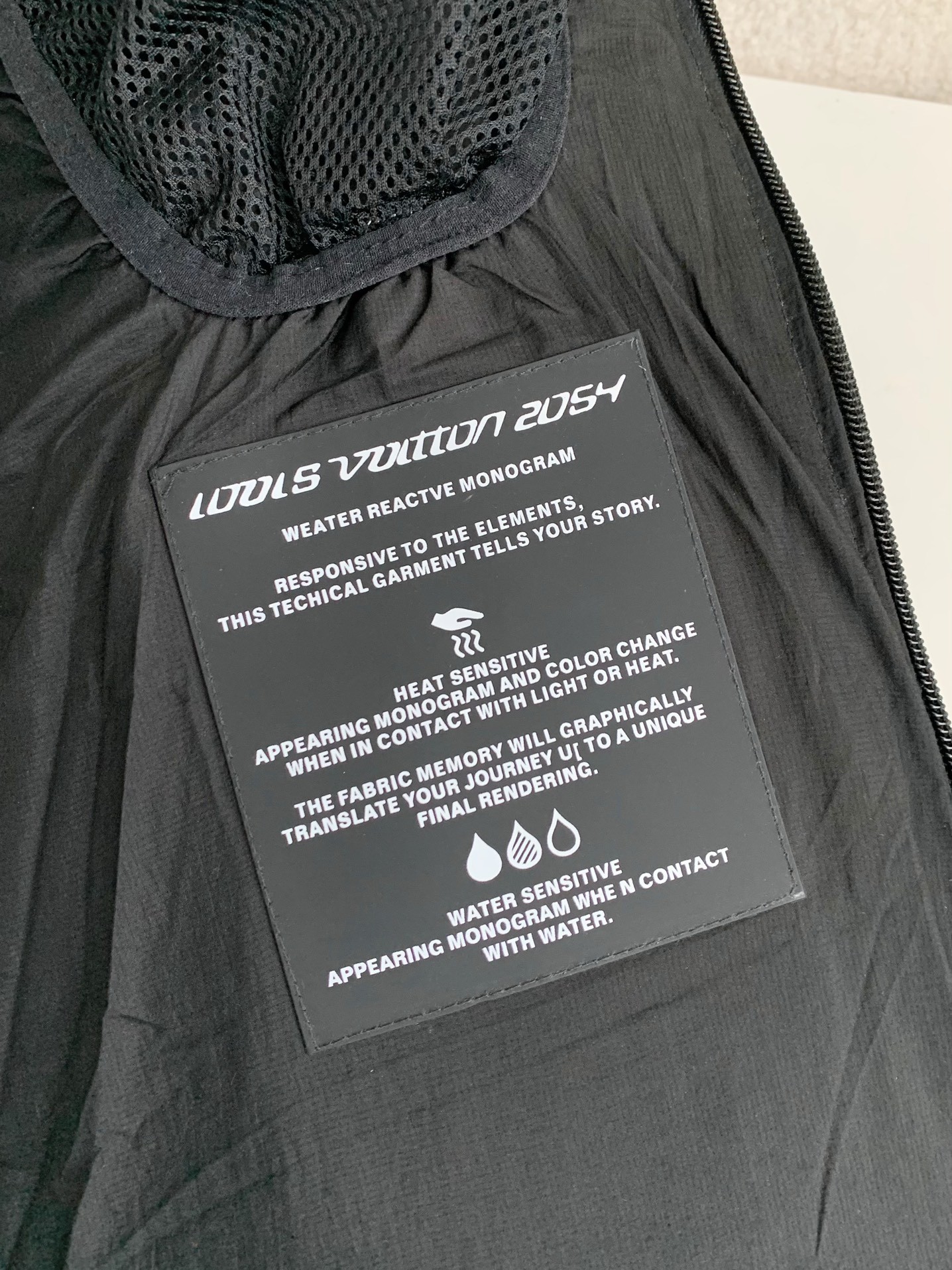 L X V LOGO Down Jacket