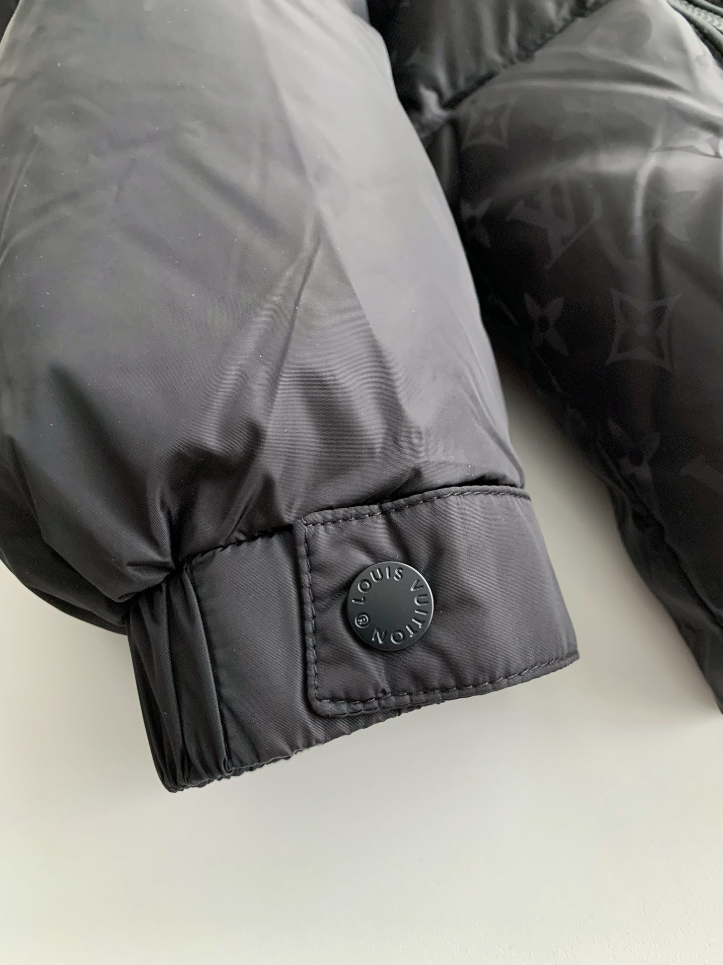 L X V LOGO Down Jacket