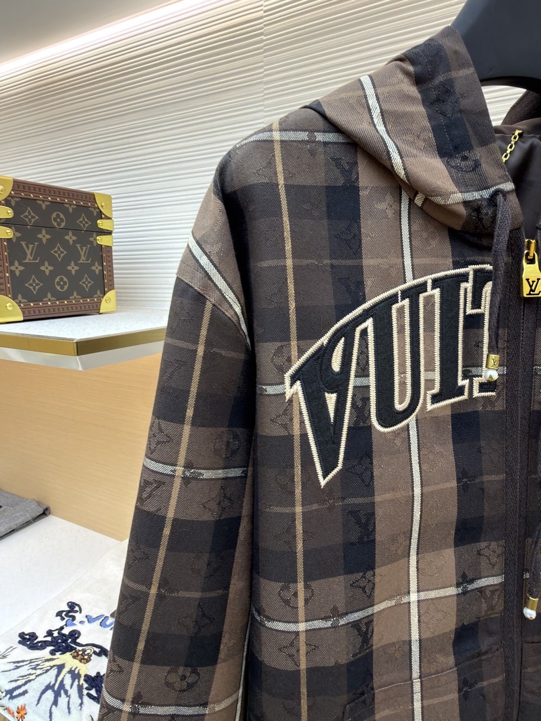L X V Checkered hooded college-style jacket 2025