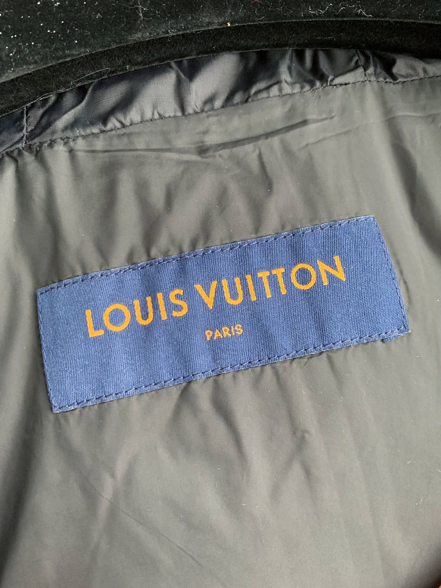L X V LOGO Down Jacket