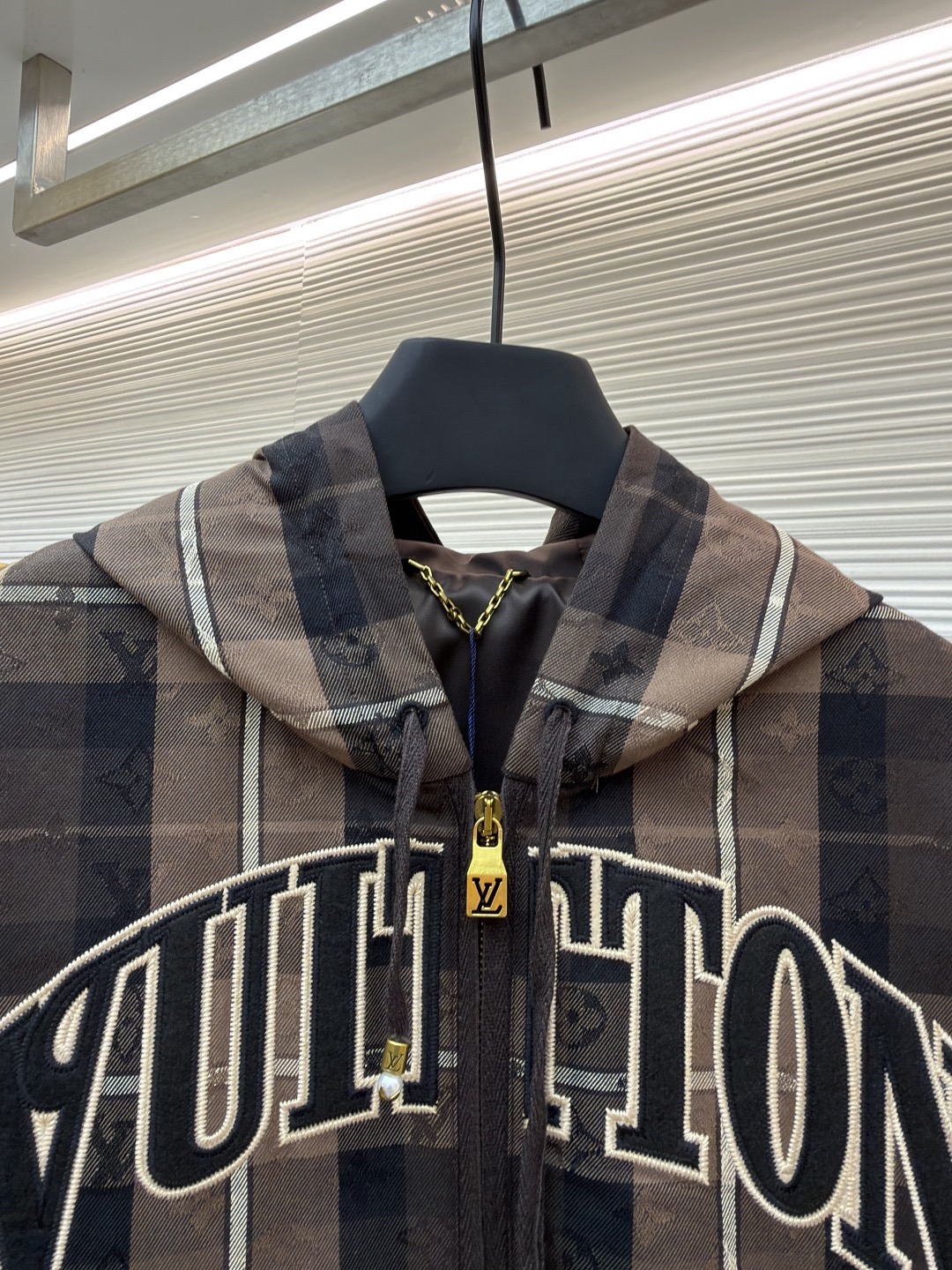 L X V Checkered hooded college-style jacket 2025