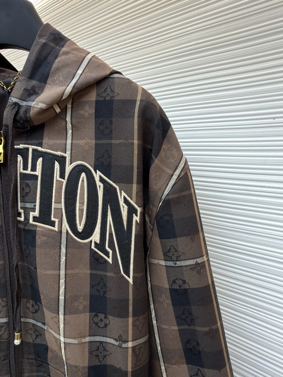 L X V Checkered hooded college-style jacket 2025