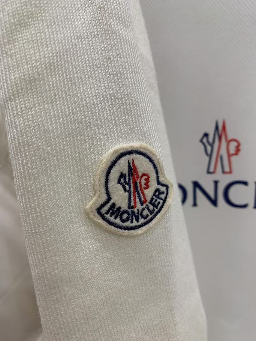 MONC new women's V-pattern stitching knitted sleeves stand collar down jacket