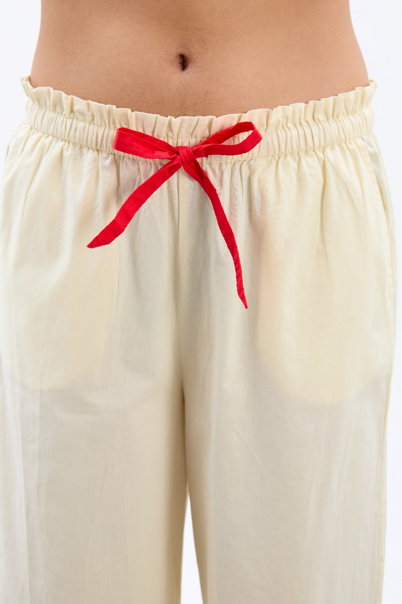 tula frilly hem trouser - butter/red