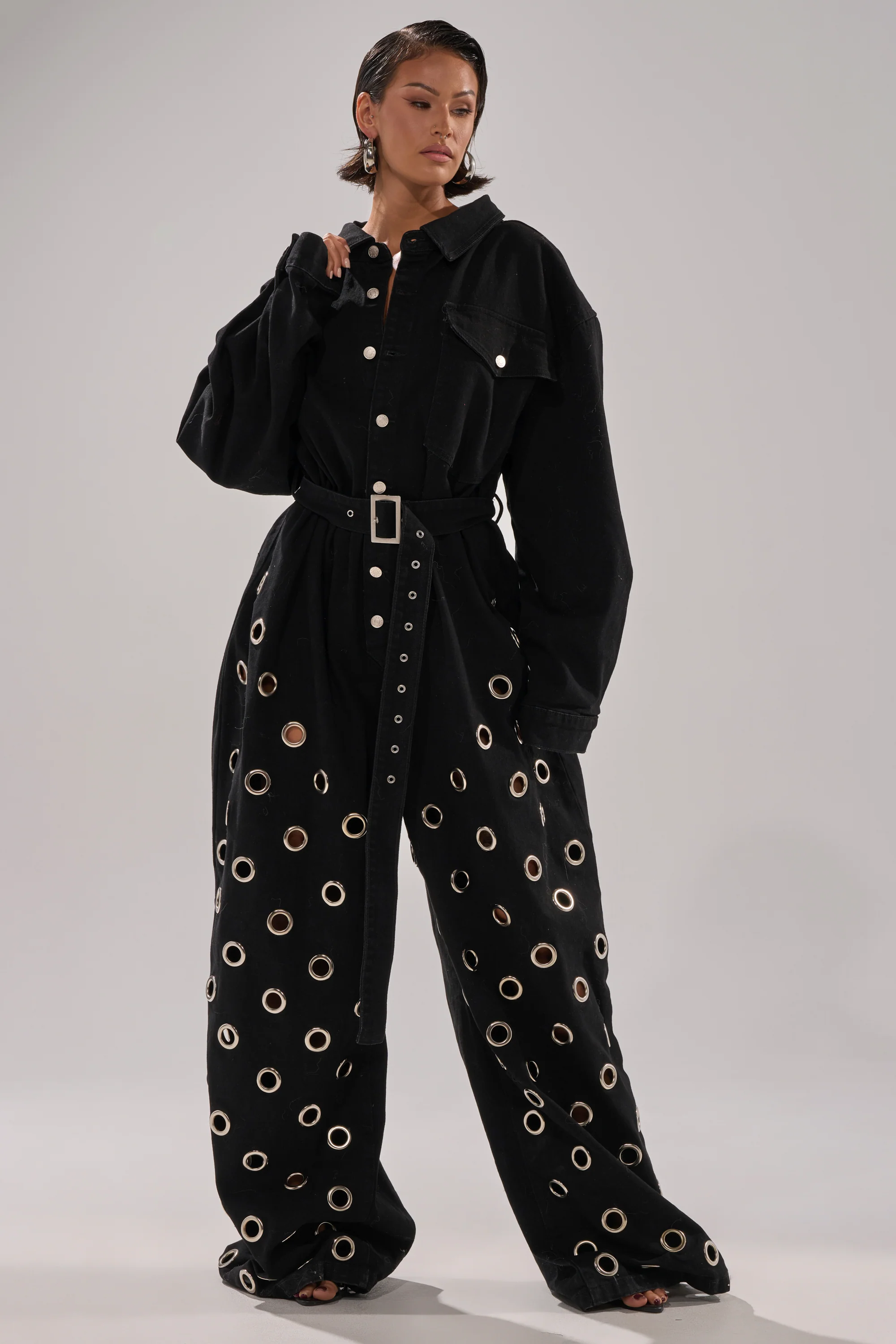 PLAY YOUR CARDS RIGHT DENIM JUMPSUIT WITH GROMMETS