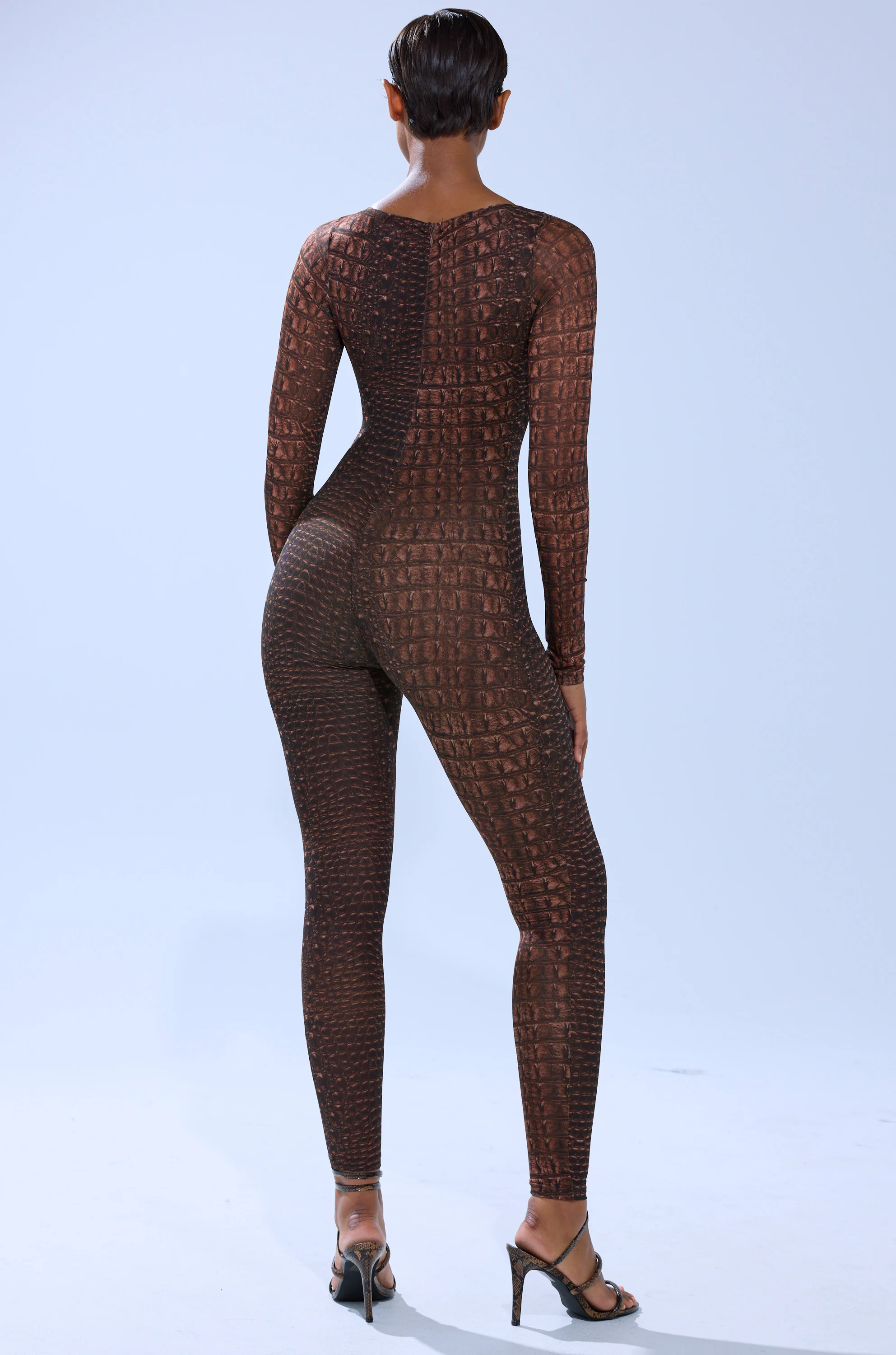 TRY AND GET ME SNAKE MESH JUMPSUIT