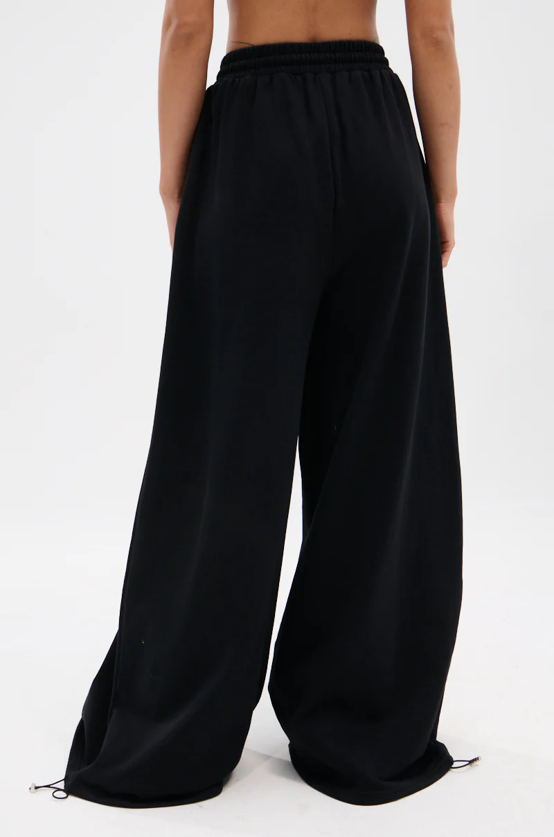 THROUGH THE NIGHT WIDE LEG SWEATPANT WITH HOLES