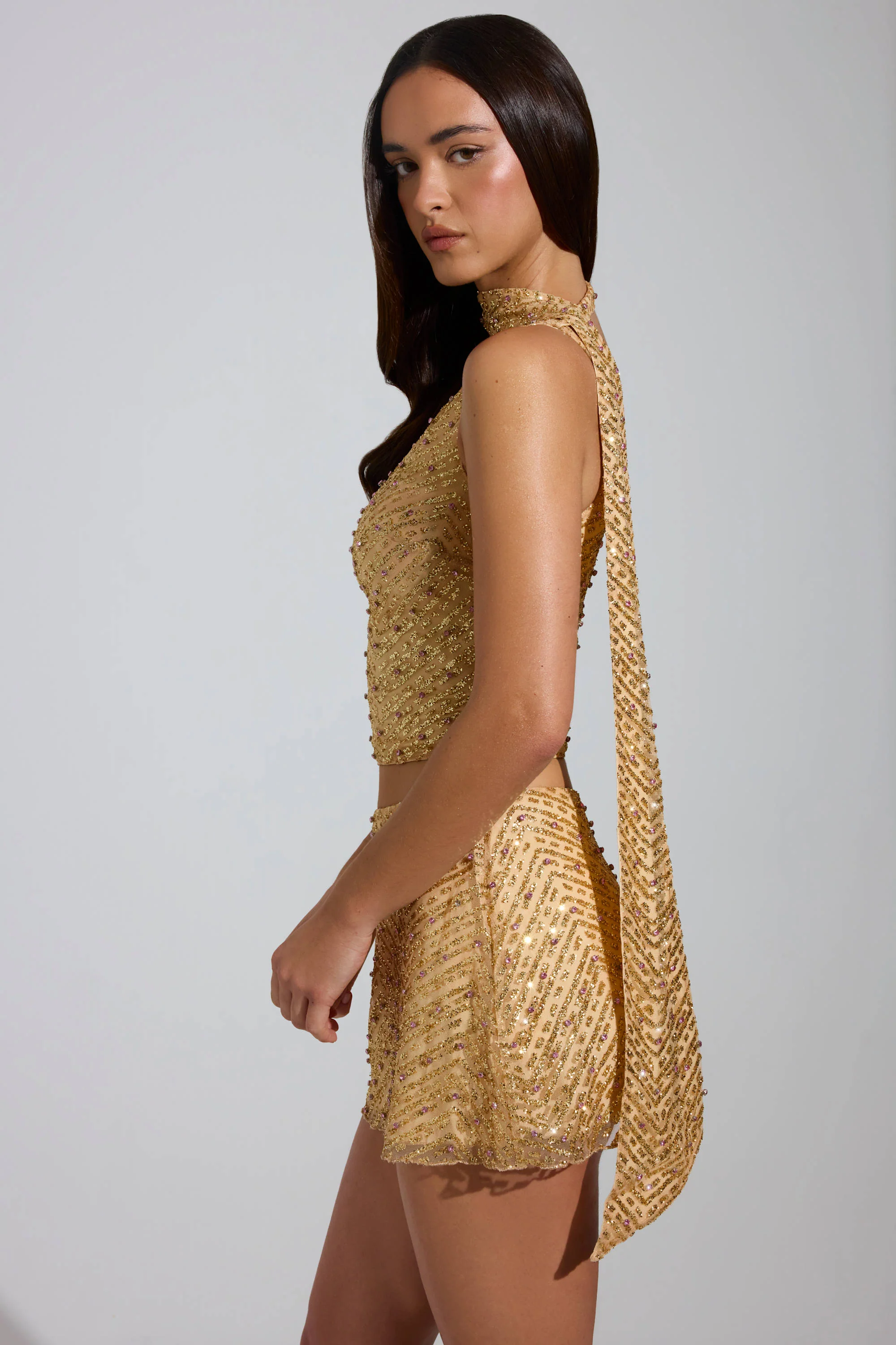 Embellished Low-Rise A-Line Micro Mini Skirt in Gold