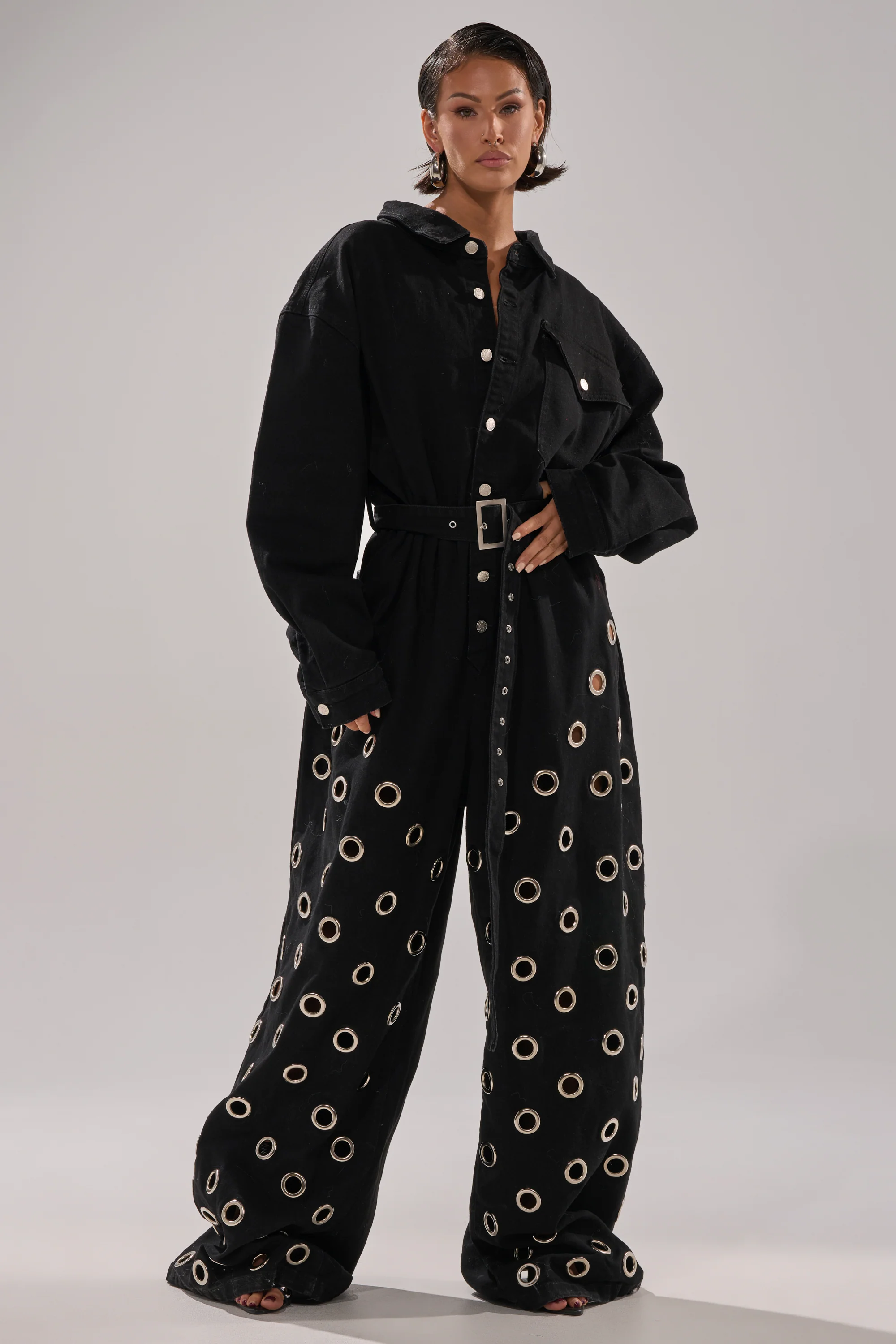PLAY YOUR CARDS RIGHT DENIM JUMPSUIT WITH GROMMETS