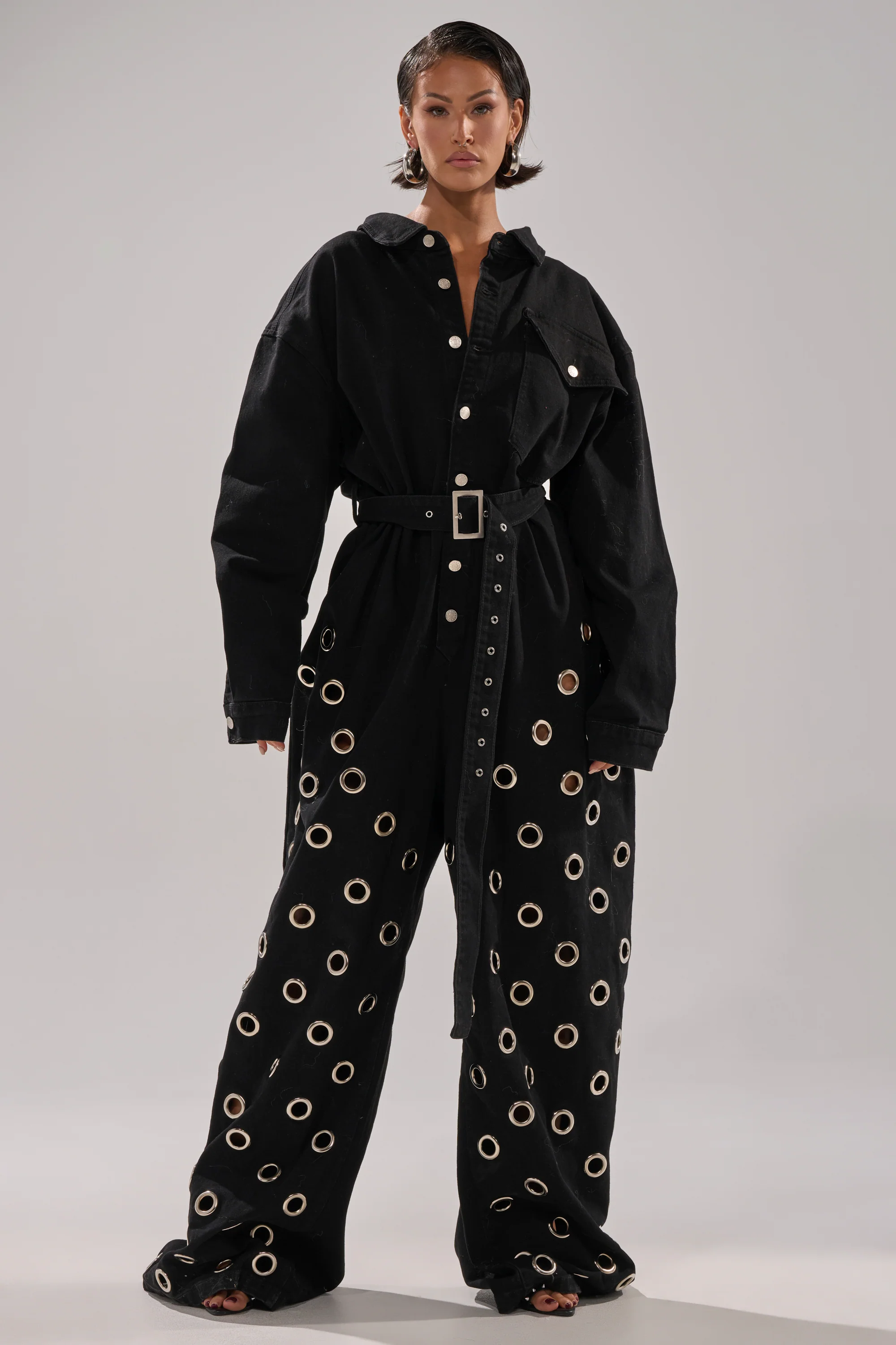 PLAY YOUR CARDS RIGHT DENIM JUMPSUIT WITH GROMMETS