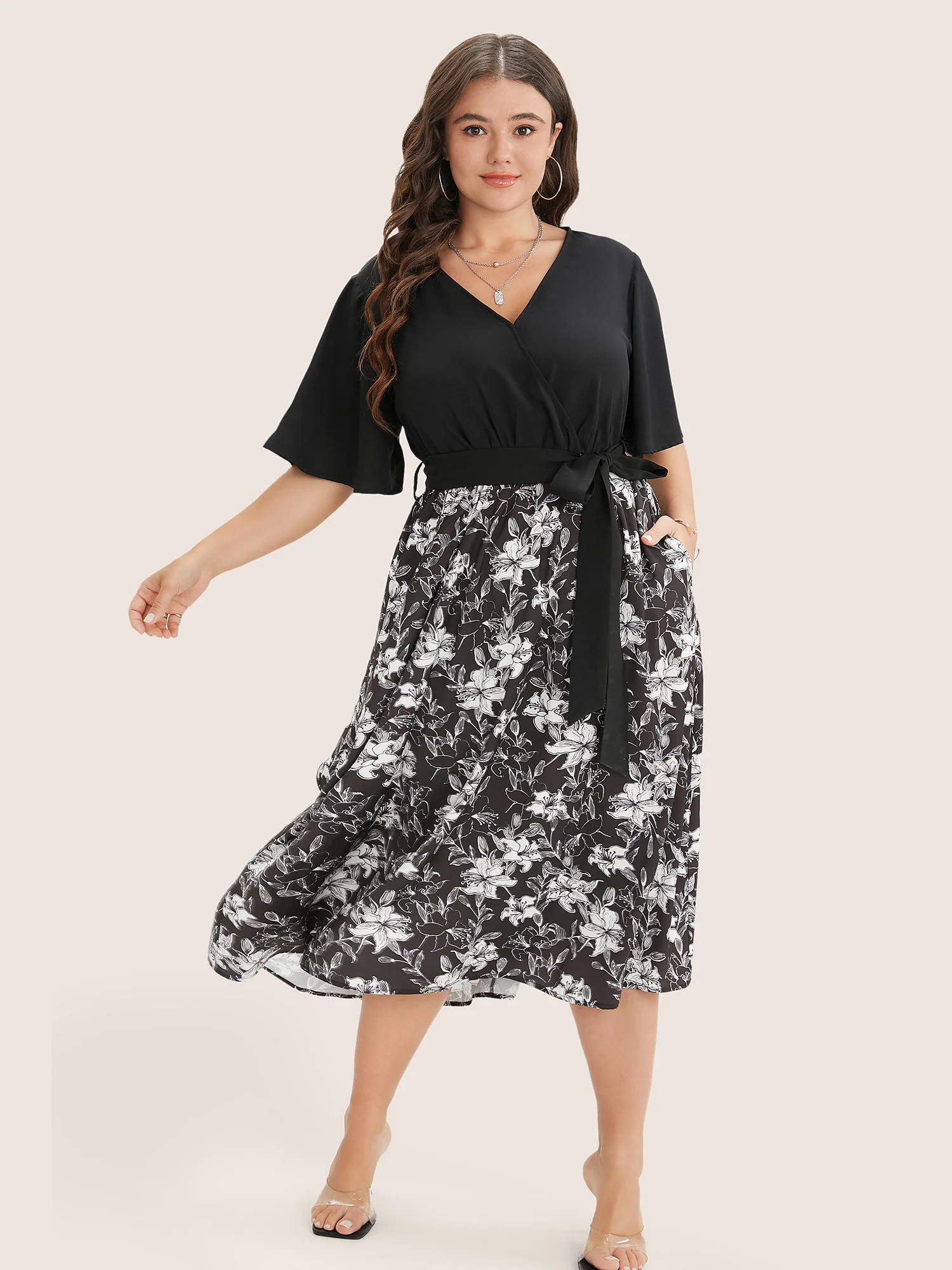 Floral Patchwork Pocket Belt Surplice Neck Ruffle Hem Dress